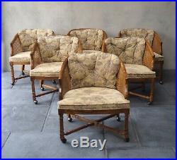 6 Vintage Dining Room Chairs Rattan and Wood on Casters Delivery Available