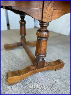 A Vintage Oak Draw Leaf Extending Dining Table, Seats Eight (c. 1930s)