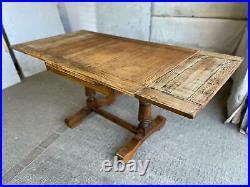 A Vintage Oak Draw Leaf Extending Dining Table, Seats Eight (c. 1930s)