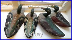 Four vintage /antique French decoy ducks, carved and painted palm and wood