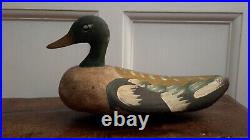 Four vintage /antique French decoy ducks, carved and painted palm and wood