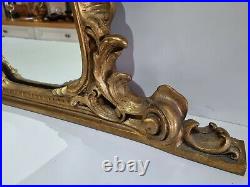 Ornate vintage Gold Gilded Wooden French Rococo Baroque style over mantel mirror