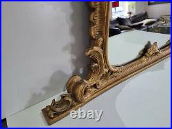 Ornate vintage Gold Gilded Wooden French Rococo Baroque style over mantel mirror