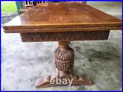 Vintage 20thC Carved Oak Extending Refectory Pedestal Dining Table Draw Leaf