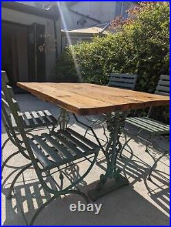Vintage French garden table wrought iron base with antique pine table top