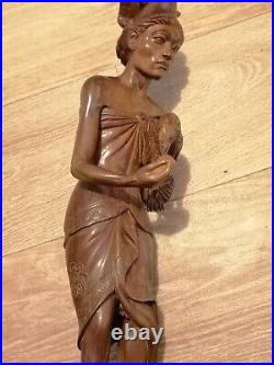 Vintage Teak Wood Carved Statue Of Indonesian(Asian) Man Feeding a Rooster