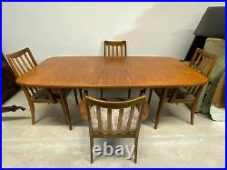 Vintage mid century G Plan teak extending dining table & 4x carver arm chairs