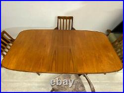 Vintage mid century G Plan teak extending dining table & 4x carver arm chairs